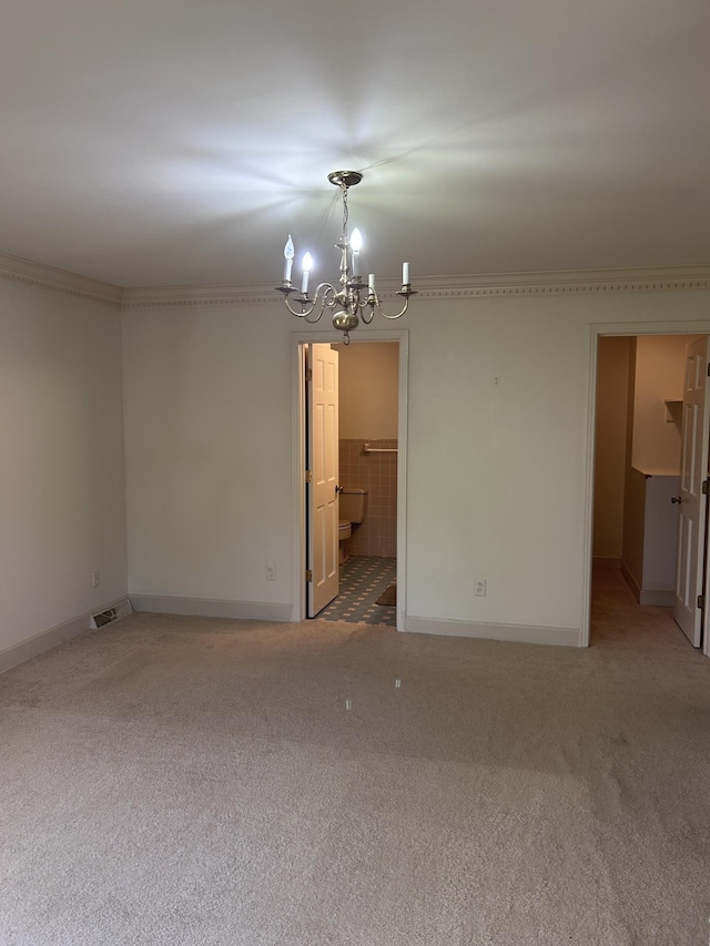 314 Powder Mill Dr, Ashland City, TN 37015 - unfurnished room featuring a chandelier, light colored carpet, baseboards, and crown molding