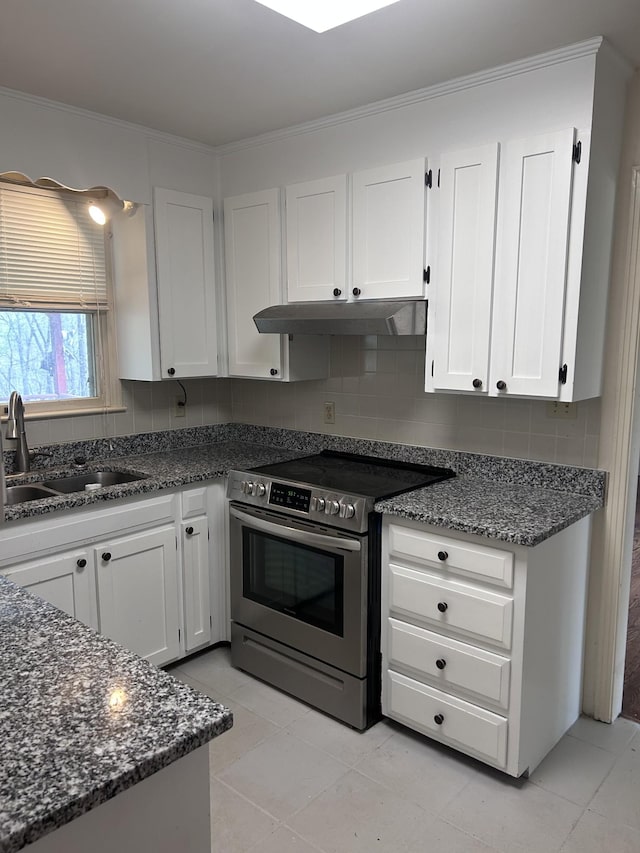314 Powder Mill Dr, Ashland City, TN 37015 - kitchen with stainless steel range with electric cooktop, a sink, white cabinetry, under cabinet range hood, and decorative backsplash