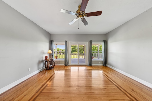 4095 Indian Hills Rd, Columbia, TN 38401 - unfurnished room with light wood finished floors, baseboards, and a ceiling fan