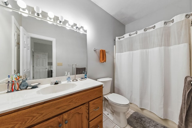 4095 Indian Hills Rd, Columbia, TN 38401 - bathroom featuring tile patterned floors, toilet, and vanity