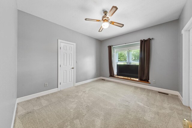 4095 Indian Hills Rd, Columbia, TN 38401 - unfurnished room with a ceiling fan, carpet floors, and baseboards