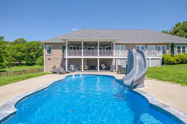 4095 Indian Hills Rd, Columbia, TN 38401 - outdoor pool with a water slide, a patio, and a ceiling fan