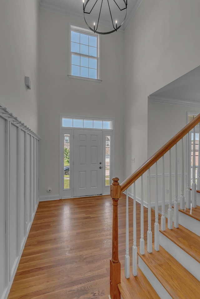 2015 Keene Cir, Spring Hill, TN 37174 - foyer with ornamental molding, wood finished floors, a chandelier, a towering ceiling, and stairway