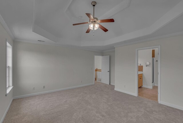 2015 Keene Cir, Spring Hill, TN 37174 - unfurnished bedroom with a raised ceiling, light carpet, ornamental molding, baseboards, and ensuite bath