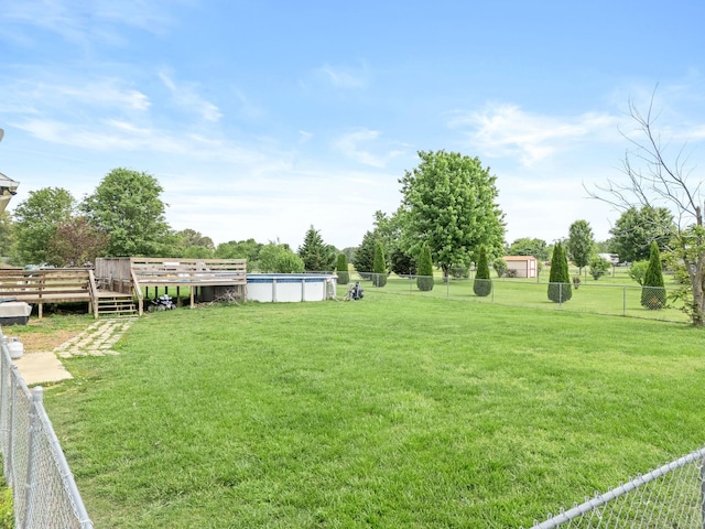 278 Riddle Rd, Manchester, TN 37355 - view of yard with an outdoor pool and a wooden deck