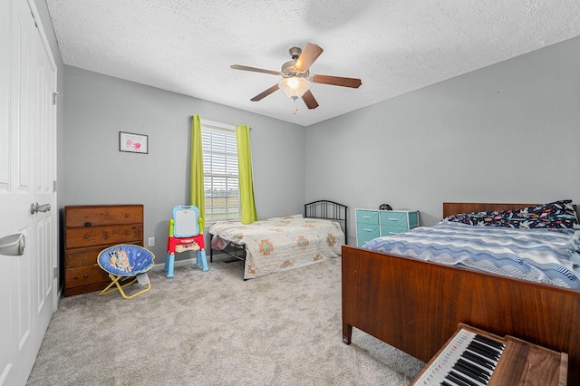 278 Riddle Rd, Manchester, TN 37355 - bedroom featuring carpet, a textured ceiling, ceiling fan, and baseboards