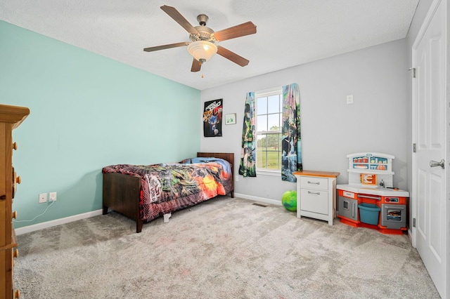 278 Riddle Rd, Manchester, TN 37355 - bedroom featuring baseboards, light colored carpet, and a ceiling fan