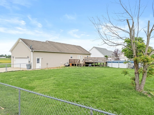 278 Riddle Rd, Manchester, TN 37355 - back of house featuring a wooden deck and an outdoor pool