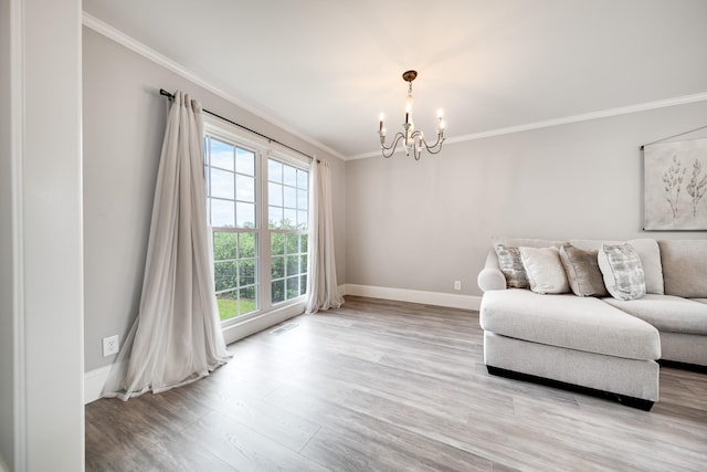 1112 Belmont Dr, Cookeville, TN 38506 - living area featuring a chandelier, crown molding, wood finished floors, and baseboards