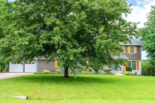 1112 Belmont Dr, Cookeville, TN 38506 - view of front of home featuring a front lawn, concrete driveway, and a garage