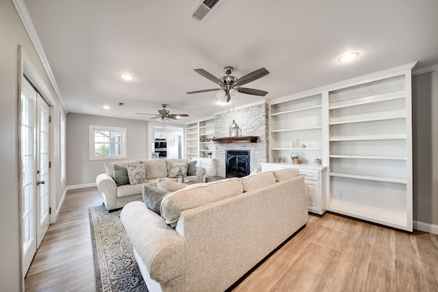 1112 Belmont Dr, Cookeville, TN 38506 - living area featuring baseboards, light wood-style flooring, a fireplace, ornamental molding, and recessed lighting