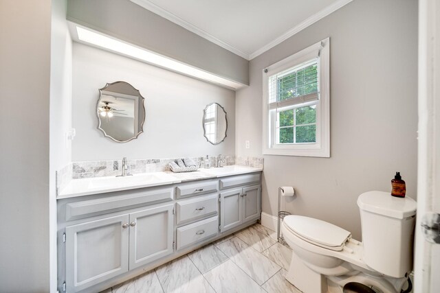 1112 Belmont Dr, Cookeville, TN 38506 - bathroom featuring toilet, marble finish floors, crown molding, double vanity, and baseboards