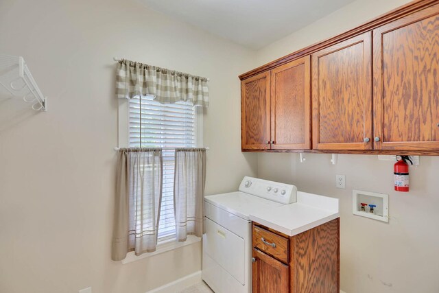 358 Spring Valley Dr, Cottontown, TN 37048 - laundry area featuring washer / dryer, cabinet space, and baseboards