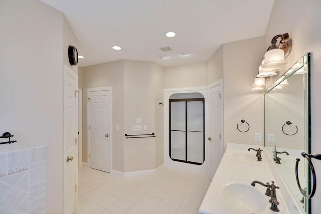 358 Spring Valley Dr, Cottontown, TN 37048 - bathroom with tile patterned flooring, double vanity, recessed lighting, and baseboards