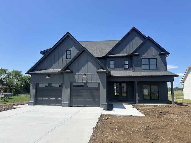 4109 Cile Ct, Murfreesboro, TN 37127 - modern inspired farmhouse featuring board and batten siding, concrete driveway, a garage, roof with shingles, and a porch