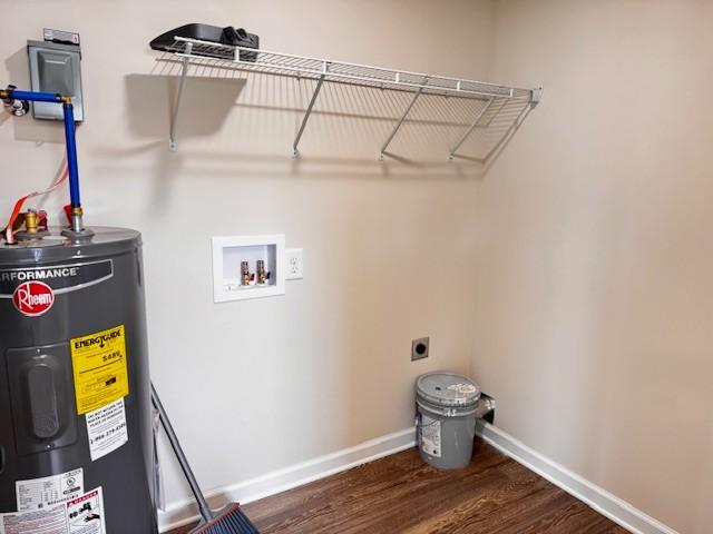 62 Modena Pl, Decherd, TN 37324 - laundry area with water heater, hookup for an electric dryer, wood finished floors, baseboards, and hookup for a washing machine