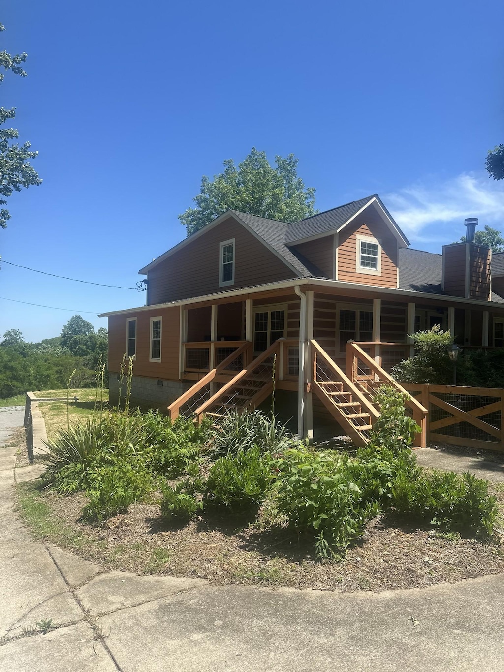 5533 Old Sams Creek Rd, Pegram, TN 37143 - view of front of home with stairway, fence, and crawl space