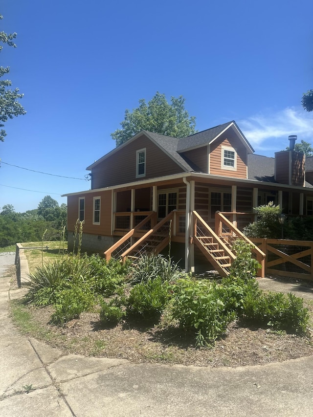 5533 Old Sams Creek Rd, Pegram, TN 37143 - view of front of home with stairway, fence, and crawl space