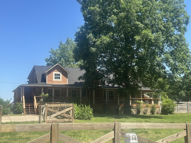 5533 Old Sams Creek Rd, Pegram, TN 37143 - log-style house with fence and covered porch