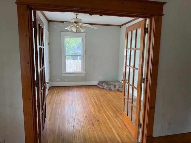 5314 Elkins Ave, Nashville, TN 37209 - unfurnished dining area with ornamental molding, hardwood / wood-style floors, ceiling fan, and baseboards