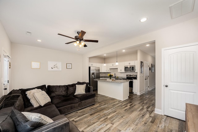 328 Fallow Cir, Clarksville, TN 37040 - living room with a ceiling fan, dark wood-type flooring, and recessed lighting