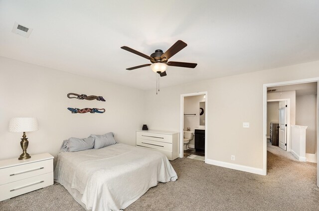 328 Fallow Cir, Clarksville, TN 37040 - bedroom featuring light carpet, baseboards, ensuite bath, and ceiling fan