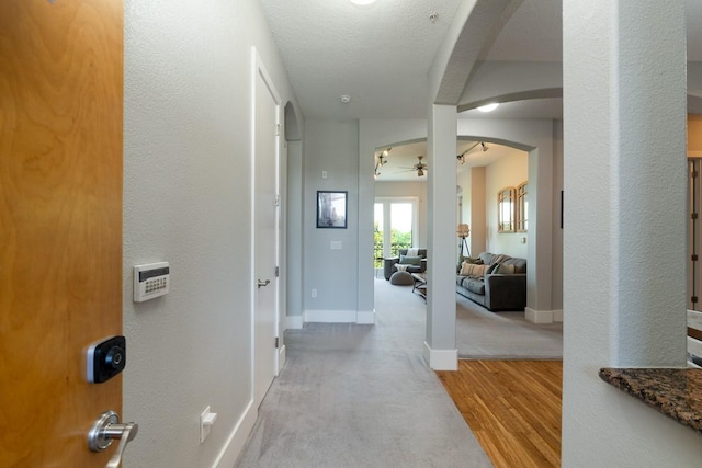 2600 Hillsboro Pike Unit 453, Nashville, TN 37212 - hall with arched walkways, wood finished floors, and baseboards