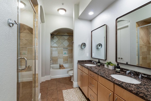2600 Hillsboro Pike Unit 453, Nashville, TN 37212 - bathroom with a tile shower, tile patterned floors, toilet, and double vanity