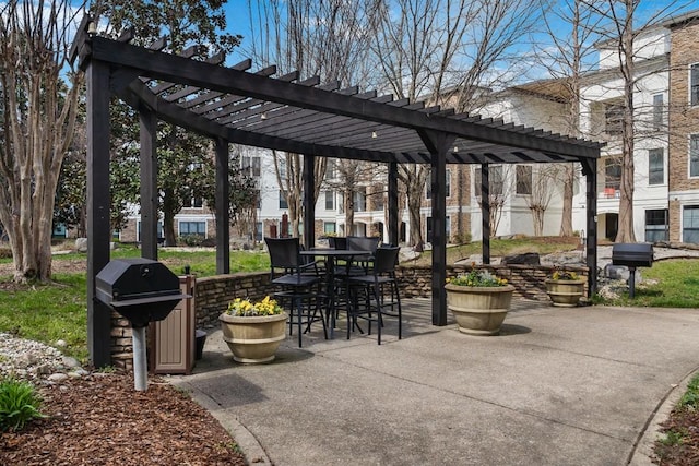 2600 Hillsboro Pike Unit 453, Nashville, TN 37212 - view of patio featuring a pergola, grilling area, and outdoor dining space