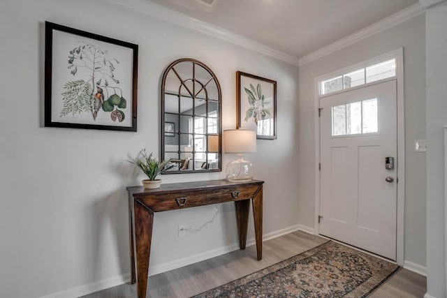4028 Roane Dr, White House, TN 37188 - entrance foyer featuring light wood-style floors, crown molding, and baseboards