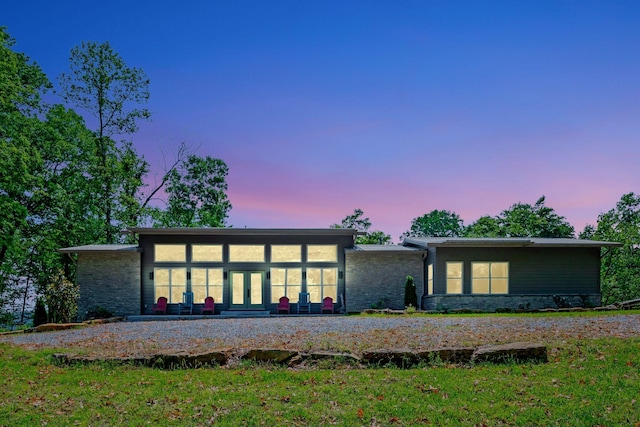1180 Wiley Pardue Rd, Ashland City, TN 37015 - back of house at dusk with french doors