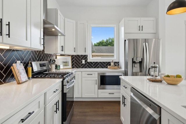 2211 18th Ave N, Nashville, TN 37208 - kitchen with appliances with stainless steel finishes, light countertops, tasteful backsplash, and white cabinetry