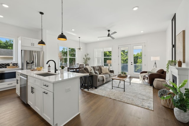 2211 18th Ave N, Nashville, TN 37208 - kitchen with a sink, appliances with stainless steel finishes, open floor plan, recessed lighting, and light countertops