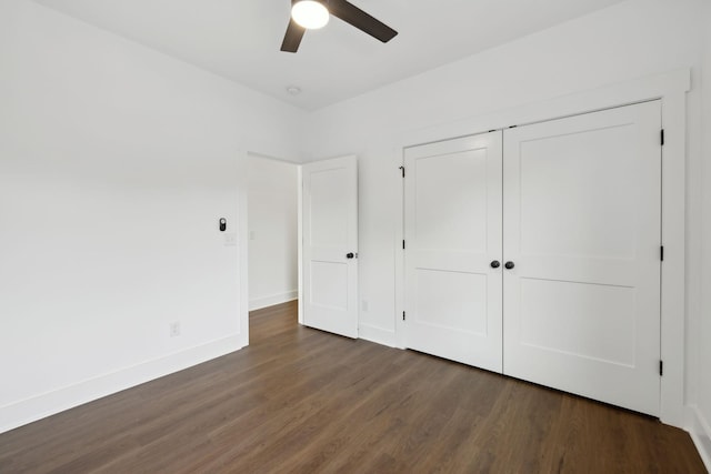 2211 18th Ave N, Nashville, TN 37208 - unfurnished bedroom with wood finished floors, a closet, baseboards, and ceiling fan