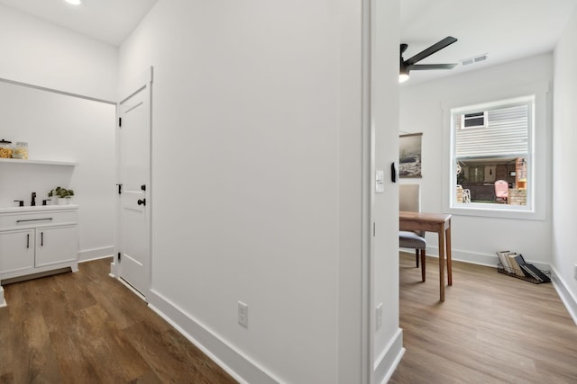 2211 18th Ave N, Nashville, TN 37208 - hallway featuring dark wood finished floors and baseboards