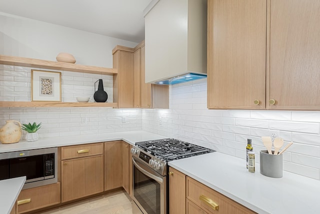 301B Oriel Ave, Nashville, TN 37210 - kitchen featuring appliances with stainless steel finishes, open shelves, wall chimney exhaust hood, light brown cabinetry, and light countertops