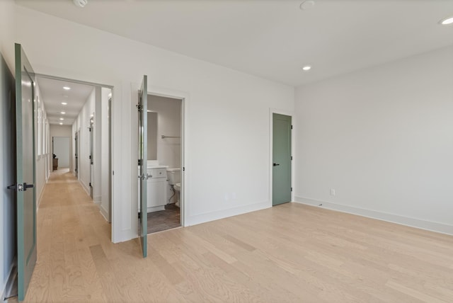 301B Oriel Ave, Nashville, TN 37210 - unfurnished bedroom with light wood finished floors, recessed lighting, and baseboards