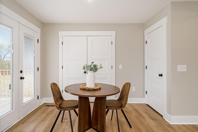 1515 Ellie Claire Way, Lewisburg, TN 37091 - dining space featuring light wood finished floors, baseboards, and french doors
