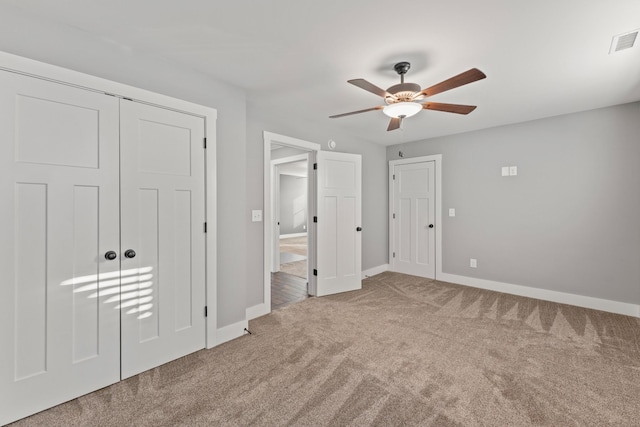512 River Watch Way, Winchester, TN 37398 - unfurnished bedroom featuring carpet, baseboards, and a ceiling fan