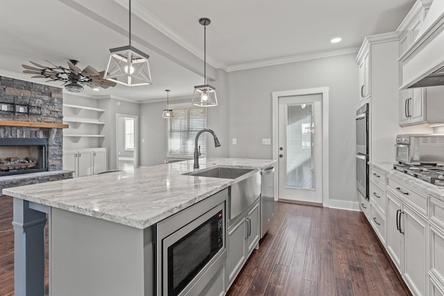 512 River Watch Way, Winchester, TN 37398 - kitchen with stainless steel appliances, a sink, premium range hood, dark wood-type flooring, and ornamental molding