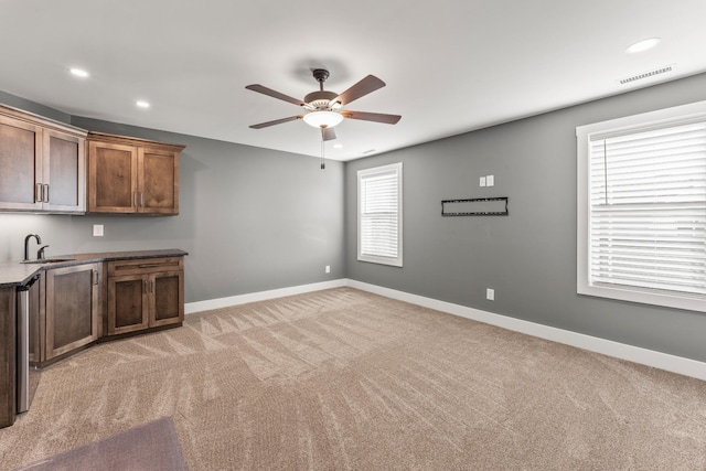 512 River Watch Way, Winchester, TN 37398 - kitchen featuring ceiling fan, light colored carpet, baseboards, a sink, and recessed lighting