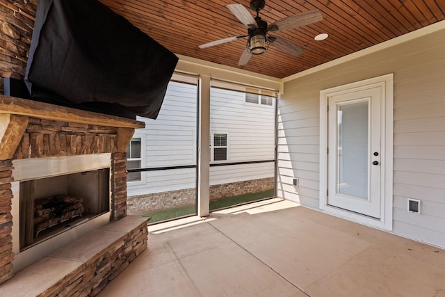 512 River Watch Way, Winchester, TN 37398 - view of patio / terrace with an outdoor stone fireplace and a ceiling fan
