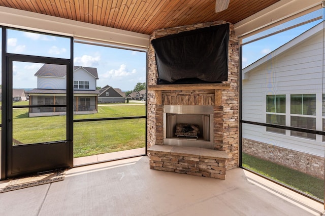 512 River Watch Way, Winchester, TN 37398 - unfurnished sunroom with an outdoor stone fireplace