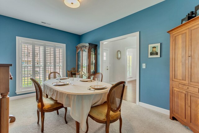 1003 Garrison Way, Spring Hill, TN 37174 - dining area featuring light colored carpet and baseboards