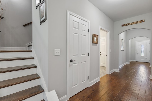864 Meadowcrest Way Unit 823, Lebanon, TN 37090 - entrance foyer featuring arched walkways, dark wood-type flooring, stairs, and baseboards