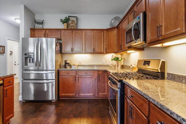 864 Meadowcrest Way Unit 823, Lebanon, TN 37090 - kitchen featuring appliances with stainless steel finishes, dark wood finished floors, and light stone countertops