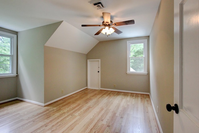 339 Thompson Ln, Clarksville, TN 37040 - additional living space featuring healthy amount of natural light, light wood-type flooring, baseboards, a ceiling fan, and vaulted ceiling