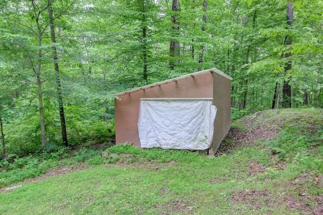 339 Thompson Ln, Clarksville, TN 37040 - view of shed with a wooded view