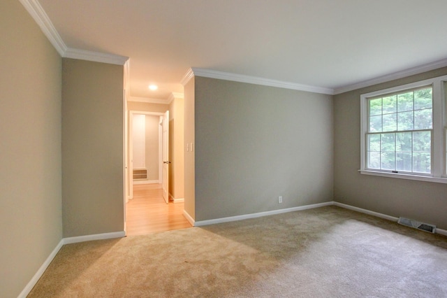 339 Thompson Ln, Clarksville, TN 37040 - unfurnished room with light carpet, crown molding, and baseboards