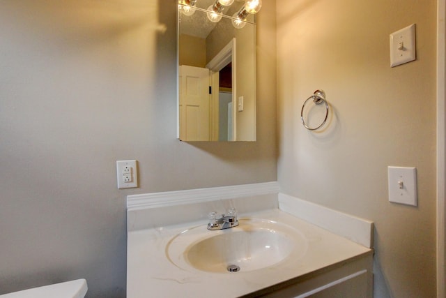 339 Thompson Ln, Clarksville, TN 37040 - half bath featuring vanity, a chandelier, and toilet